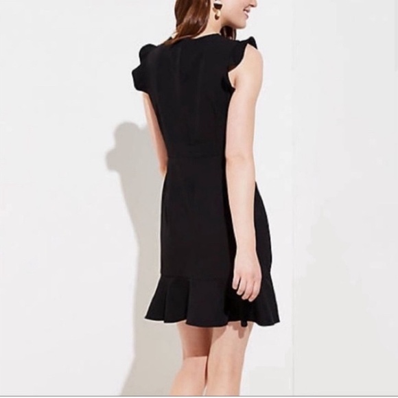 New with tags flounce, asymmetrical black dress. - Picture 2 of 3
